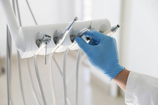 Professional Emergency Dentist technician working in Moss Beach, CA
